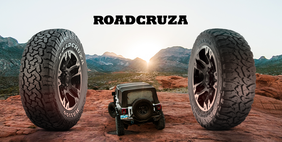 Ilustração: dois pneus Roadcruza em pé em um terreno rochoso com um jipe entre eles.